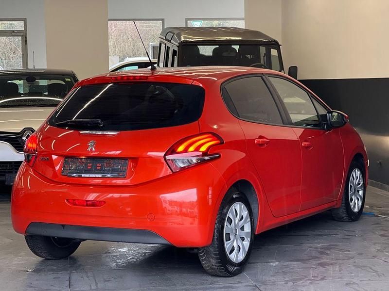Gebraucht Peugeot 208 Active 82 PS (60 kW) 2018 Orange Kleinwagen