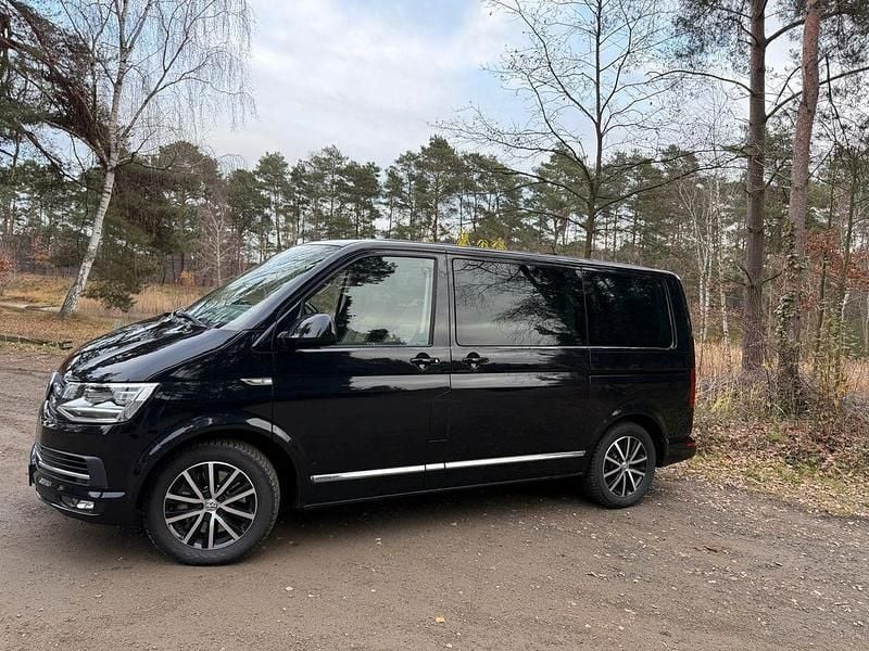 Schwarz Gebraucht 2015 VW Multivan Highline Van | 25.999 € (Superpreis) - Bild 1/4