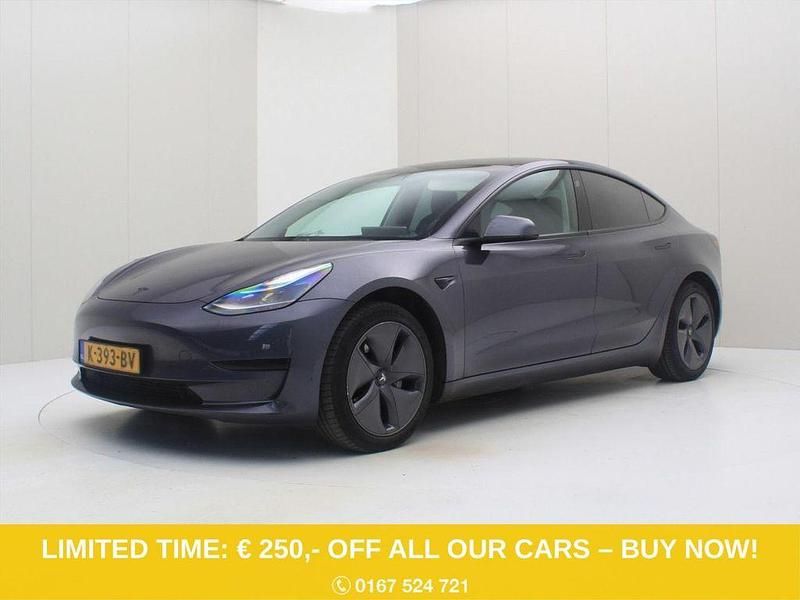 Grau Gebraucht 2020 Tesla Model 3 Standard Range Limousine | 18.900 € (Fairer Preis) - Bild 1/4
