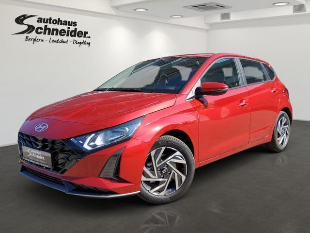 Dragon red metallic (metallic) Gebraucht 2024 Hyundai i20 Trend Limousine | 17.990 € (Fairer Preis) - Bild 1/4