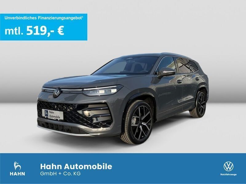 Delfingrau metallic Gebraucht 2025 VW Tayron R-line SUV | 56.980 € (Superpreis) - Bild 1/3