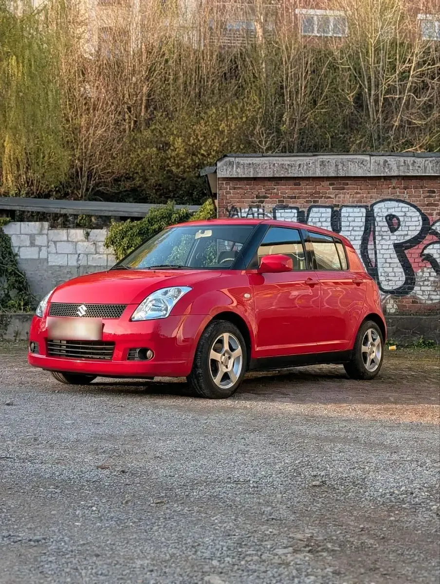 Usado Suzuki Swift 92 HP (67 kW) 2005 Vermelho Citadino