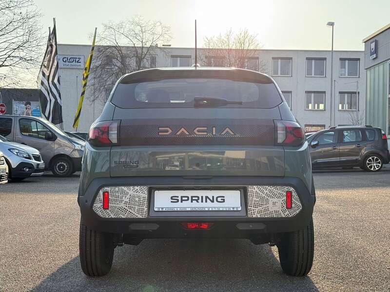 Gebraucht Dacia Spring Extreme 47 kW (65 PS) 2024 Oliv grün Kleinwagen