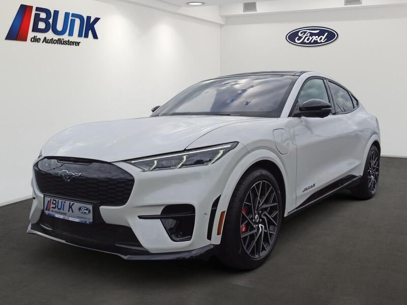 Starweiß metallic Gebraucht 2025 Ford Mustang Mach-E GT SUV | 49.990 € - Bild 1/4
