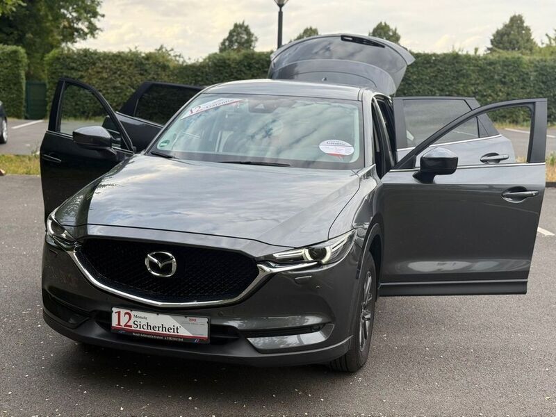 Machine gray Gebraucht 2019 Mazda CX-5 Exclusive-Line SUV | 20.999 € (Fairer Preis) - Bild 1/4
