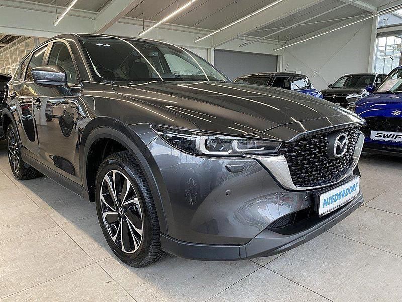 Machine grey (metallic) Gebraucht 2024 Mazda CX-5 Ad'Vantage SUV | 34.990 € (Guter Preis) - Bild 1/4