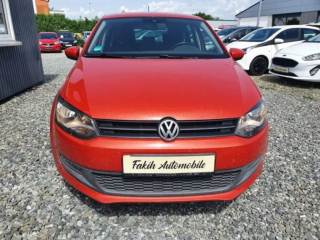 Gebraucht VW Polo Team 69 PS (50 kW) 2010 Hot orange metallic Kleinwagen