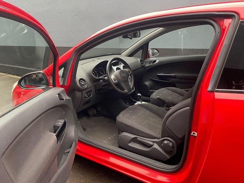 Second-hand Opel Corsa 90 CP (66 kW) 2012 Roșu Hatchback