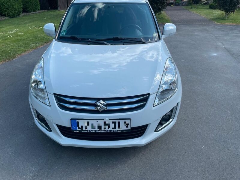 Weiß Gebraucht 2016 Suzuki Swift X-TRA Limousine | 8.499 € (Fairer Preis) - Bild 1/4
