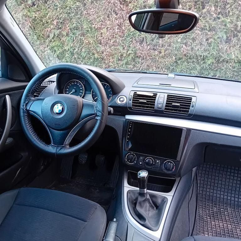 Używany BMW 116 122 KM (89 kW) 2008 Czarny Hatchback