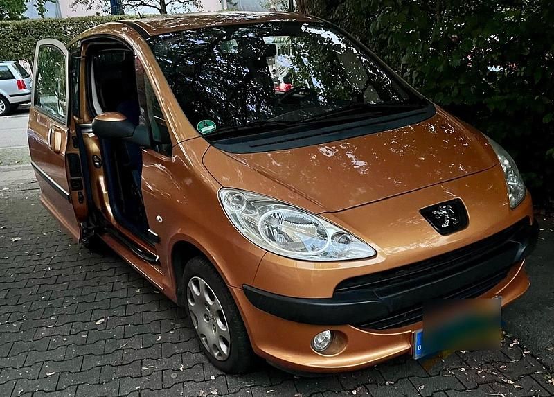 Orange Gebraucht 2007 Peugeot 1007 Kleinwagen | 3.099 € (Teuer) - Bild 1/4