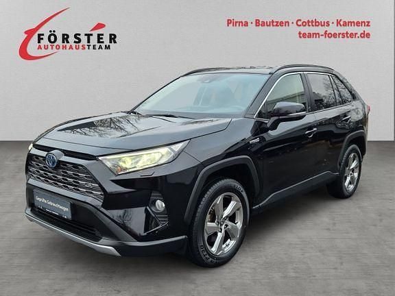 Tiefschwarz mica metallic Gebraucht 2021 Toyota RAV4 Hybrid Plus SUV | 33.490 € (Fairer Preis) - Bild 1/4