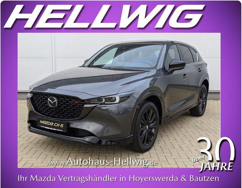 Machine grey metallic (metallic) Gebraucht 2024 Mazda CX-5 Homura-Line SUV | 36.580 € (Guter Preis) - Bild 1/4