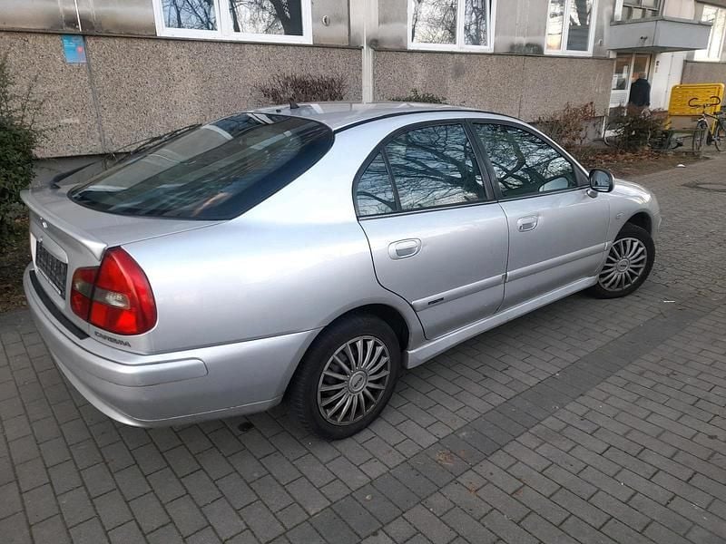 Gebraucht Mitsubishi Carisma 115 PS (84 kW) 2001 Silber Limousine