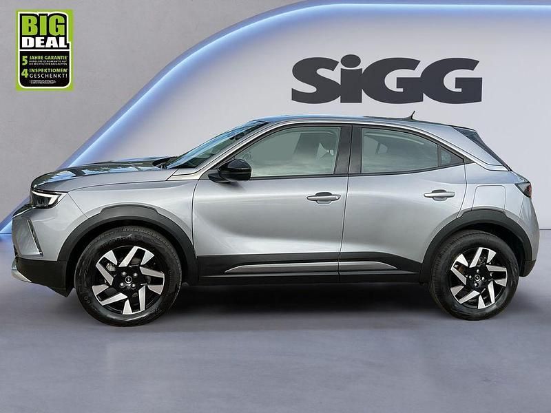 Gebraucht Opel Mokka Elegance 101 PS (74 kW) 2022 Kontrast grau/quarz silber SUV