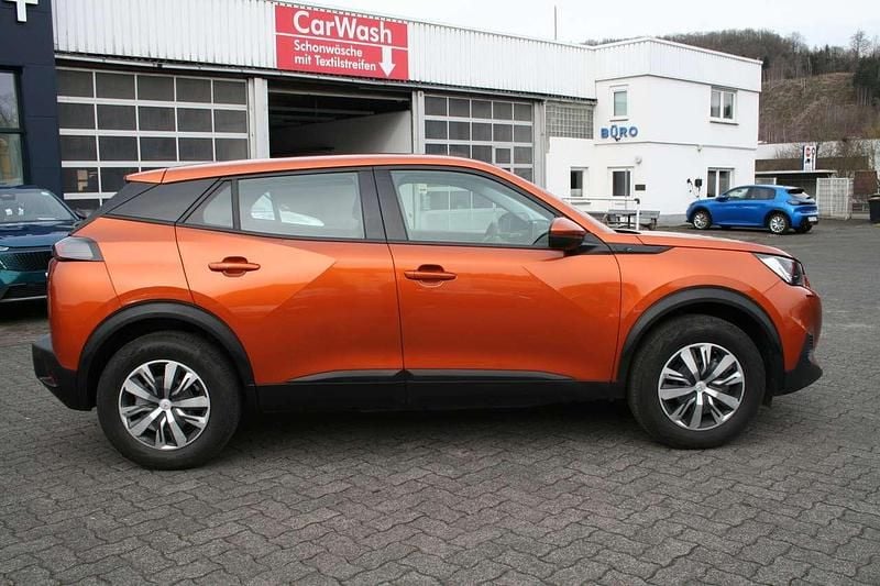 Second-hand Peugeot e-2008 Active 100 kW (136 CP) 2021 Portocaliu SUV