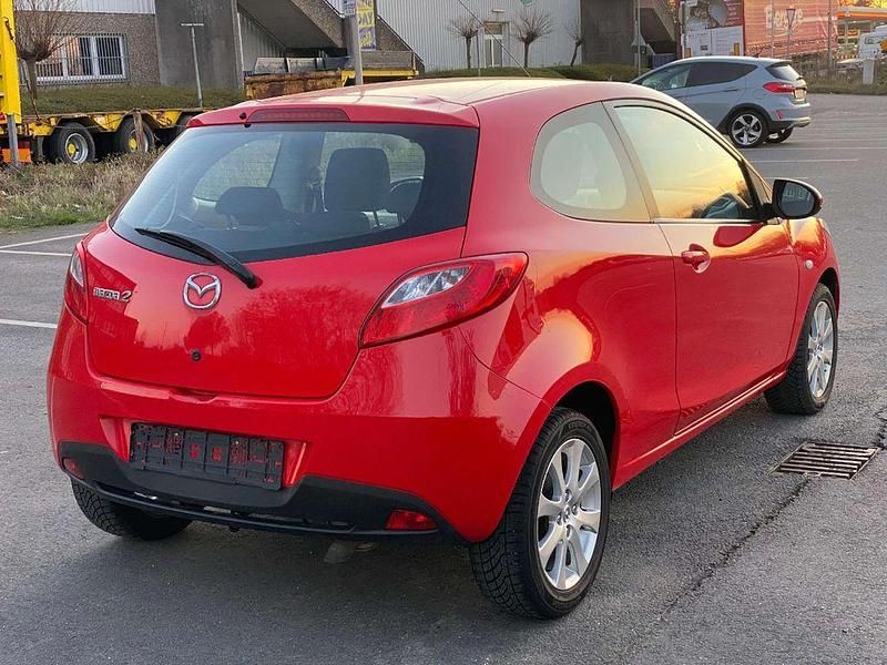 Second-hand Mazda 2 Inclusive 68 CP (50 kW) 2009 Roșu Hatchback