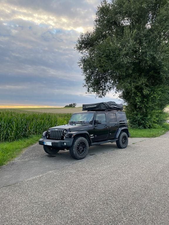 Schwarz Gebraucht 2014 Jeep Wrangler Sahara SUV | 28.500 € (Guter Preis) - Bild 1/4