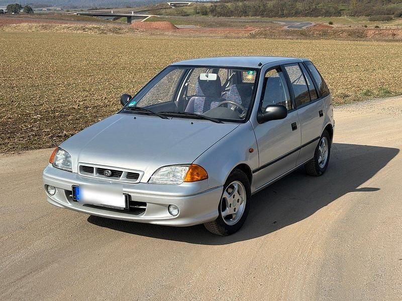 Silber Gebraucht 2003 Subaru Justy Kleinwagen | 2.300 € (Fairer Preis) - Bild 1/4