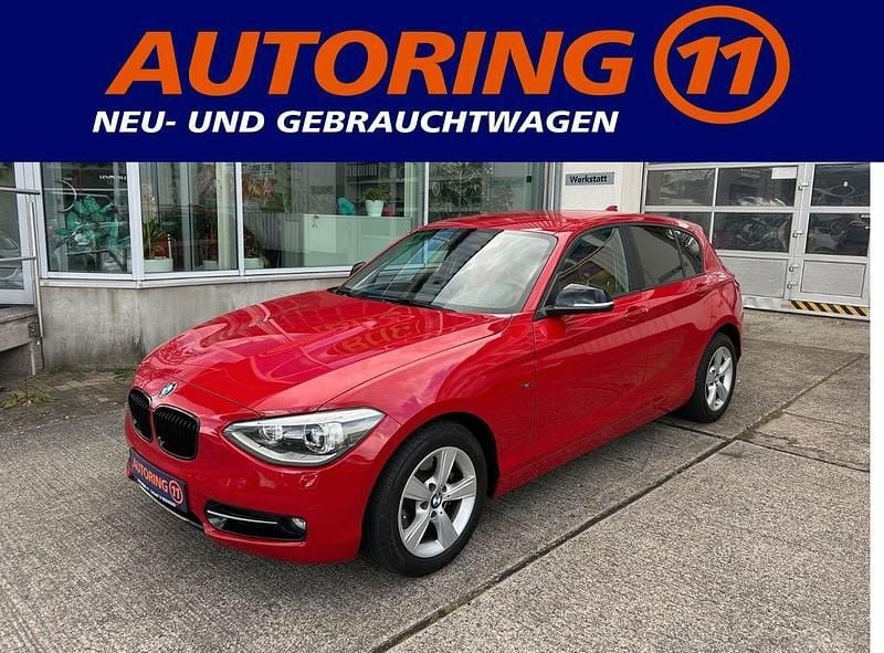 Rot Gebraucht 2013 BMW 118 Sport Line Kleinwagen | 12.990 € (Fairer Preis) - Bild 1/4