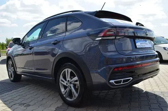 Gebraucht VW Taigo R-line 116 PS (85 kW) 2024 Grau (rauchgrau metallic) SUV