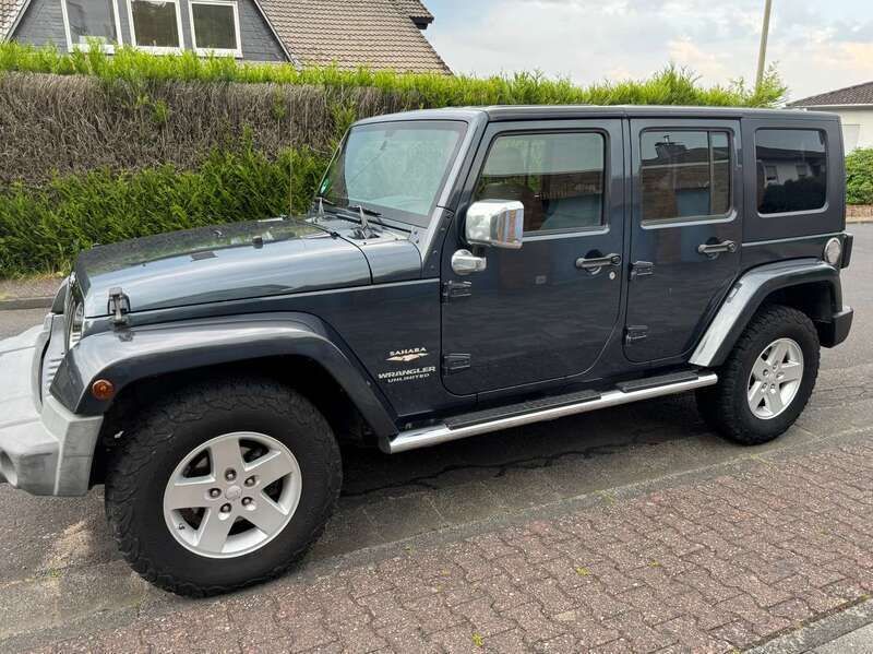 Blau Gebraucht 2007 Jeep Wrangler Unlimited SUV | 16.900 € (Fairer Preis) - Bild 1/4
