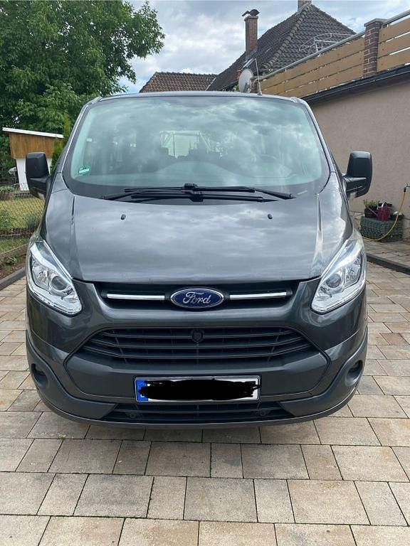Grau Gebraucht 2016 Ford Tourneo Custom Titanium Van / Kleinbus | 17.990 € (Guter Preis) - Bild 1/4