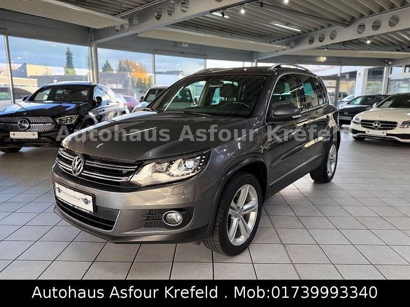 Grau Gebraucht 2016 VW Tiguan LOUNGE SUV | 18.490 € (Guter Preis) - Bild 1/4