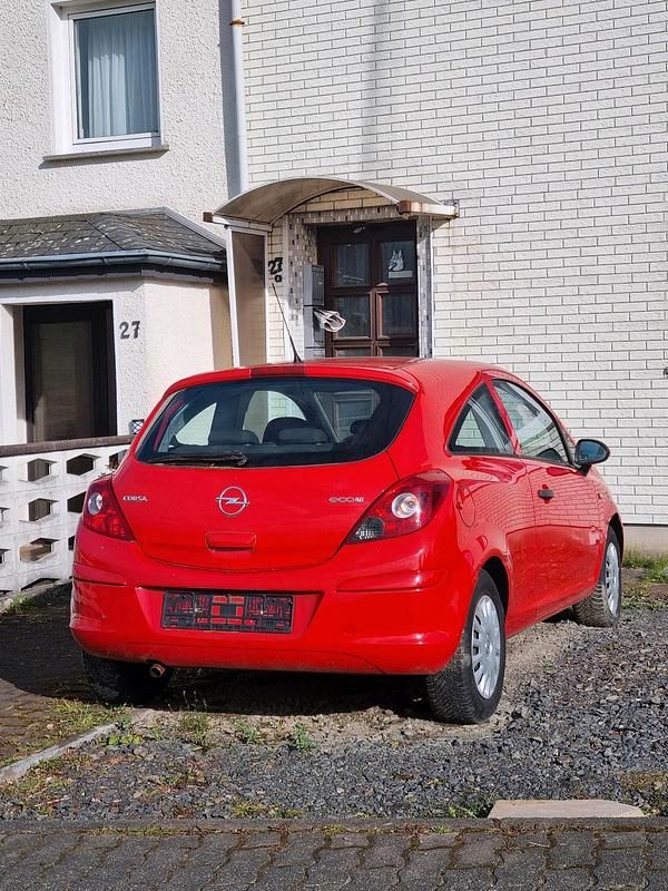 Gebraucht Opel Corsa 80 PS (58 kW) 2010 Rot Kleinwagen