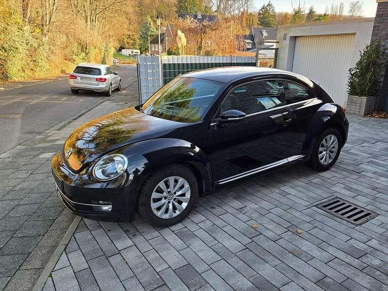 Deep black perleffekt Gebraucht 2014 VW Beetle Design Kleinwagen | 8.690 € (Guter Preis) - Bild 1/4
