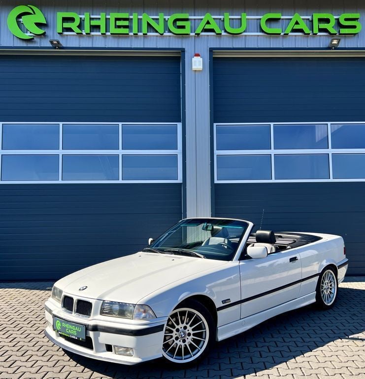 Alpinweiss iii Gebraucht 1995 BMW 318 Cabriolet Performance Cabrio | 8.490 € - Bild 1/4