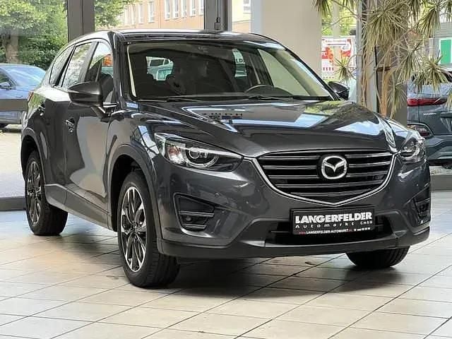Graphitgrau metallic Gebraucht 2017 Mazda CX-5 Nakama SUV | 19.999 € (Fairer Preis) - Bild 1/4