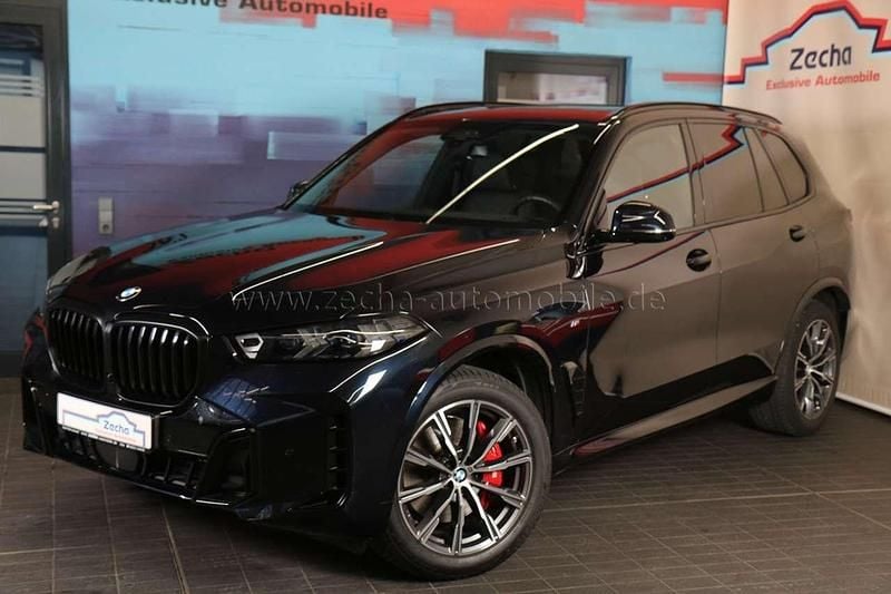 Carbonschwarz (416) Gebraucht 2024 BMW X5 Performance SUV | 77.499 € (Superpreis) - Bild 1/4