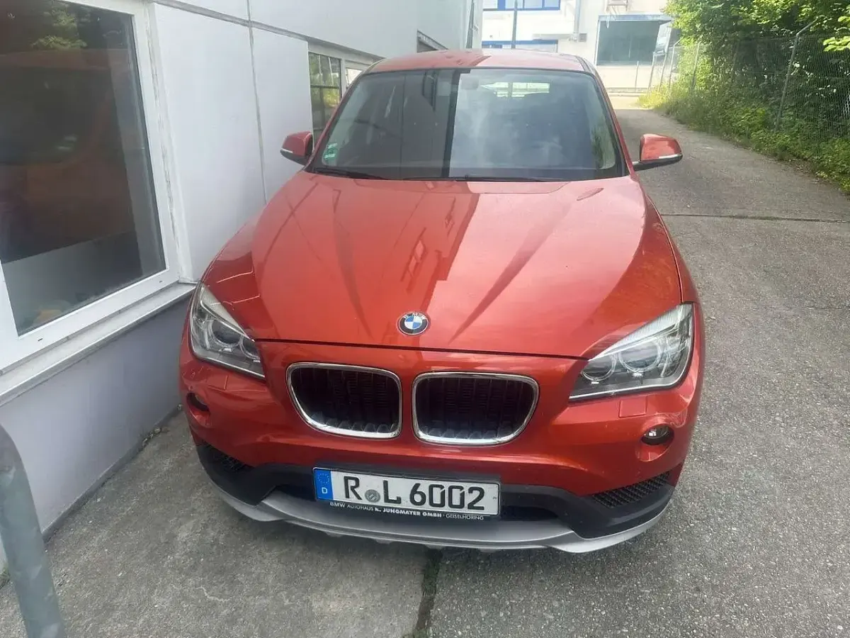 Gebraucht BMW X1 150 PS (110 kW) 2014 Valencia orange SUV