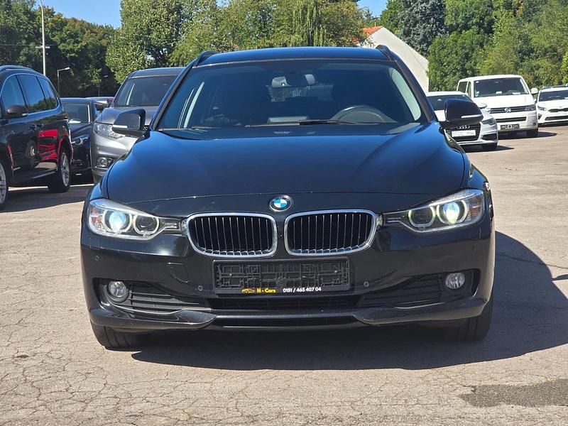Schwarz Gebraucht 2014 BMW 318 Sport Line Kombi | 7.990 € (Superpreis) - Bild 1/4