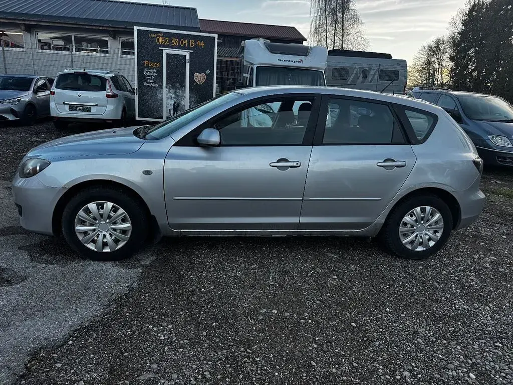 Second-hand Mazda 3 Active 105 CP (77 kW) 2006 Argintiu Berlinǎ