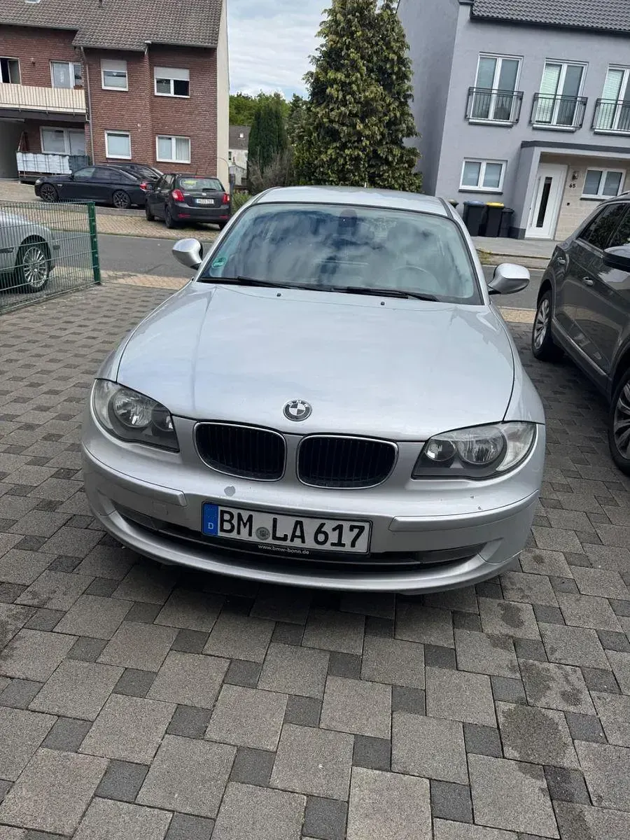 Używany BMW 116 122 KM (89 kW) 2010 Srebrny Hatchback