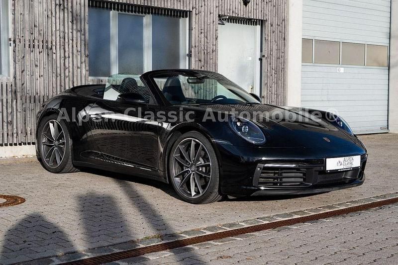 Tiefschwarz Gebraucht 2021 Porsche 911 Carrera 4 Cabriolet Cabrio | 115.900 € (Fairer Preis) - Bild 1/4