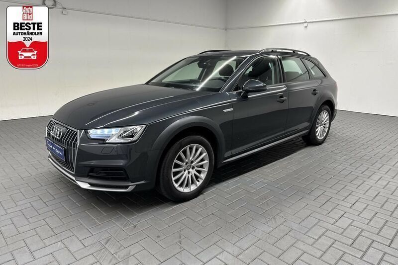 Grau (manhattangraumet.) Gebraucht 2018 Audi A4 Allroad Comfort Kombi | 25.480 € (Fairer Preis) - Bild 1/4