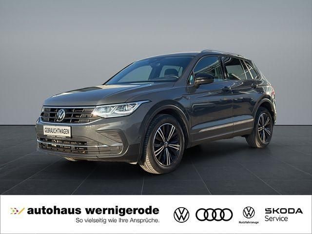 Delfingrau metallic Gebraucht 2021 VW Tiguan Active SUV | 27.939 € (Fairer Preis) - Bild 1/4