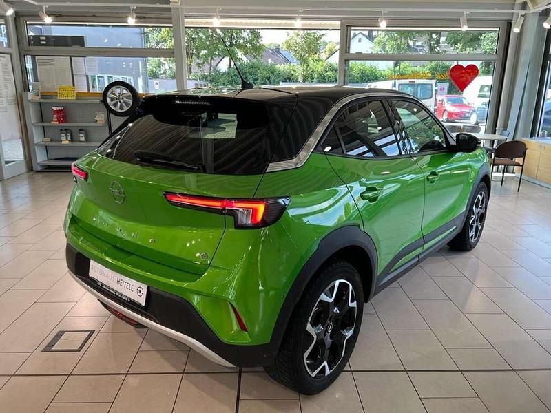 Gebraucht Opel Mokka-e Ultimate 100 kW (136 PS) 2021 Matcha green/ikone gruen SUV