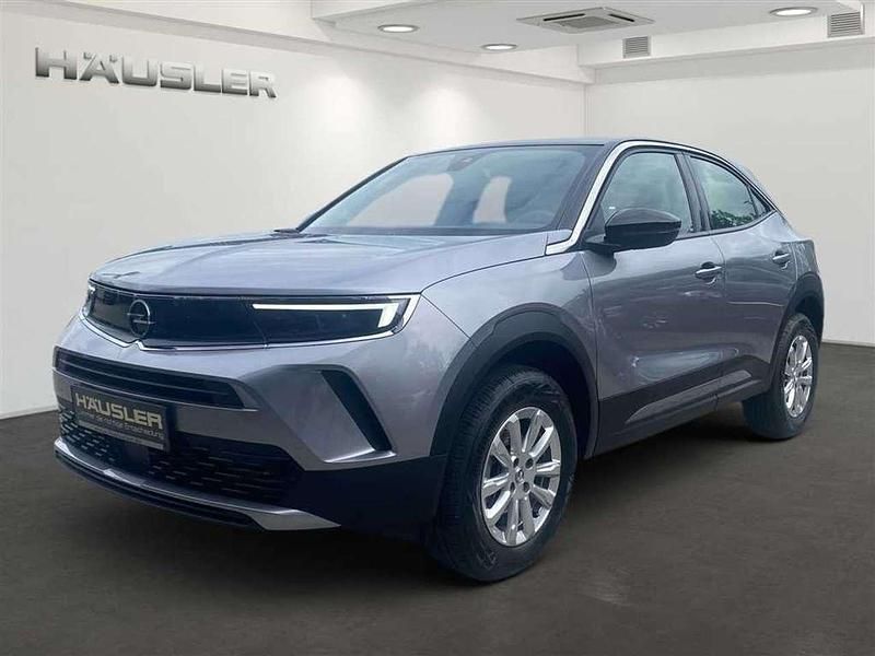 Kontrast grau Gebraucht 2023 Opel Mokka Enjoy SUV | 19.650 € (Fairer Preis) - Bild 1/4