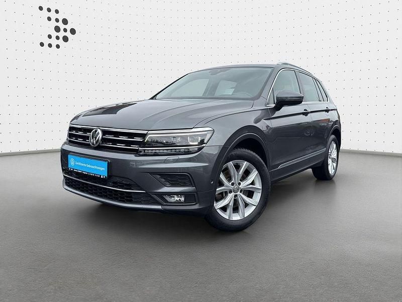 Indiumgrau metallic (metallic) Gebraucht 2018 VW Tiguan Highline SUV | 27.485 € (Fairer Preis) - Bild 1/4