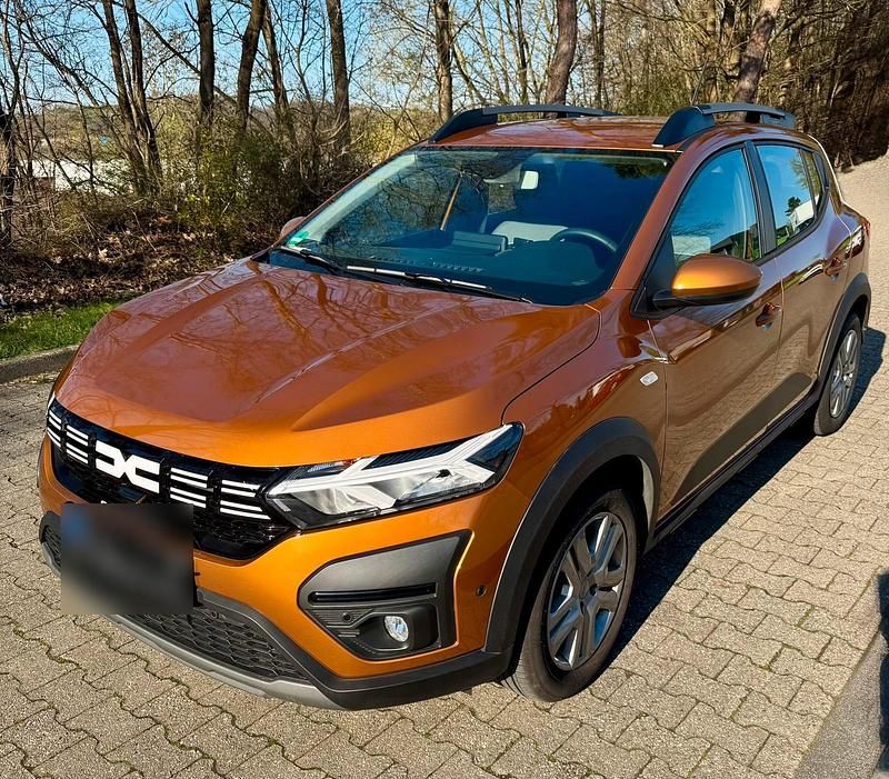 Gebraucht Dacia Sandero Expression 91 PS (66 kW) 2023 Orange Limousine
