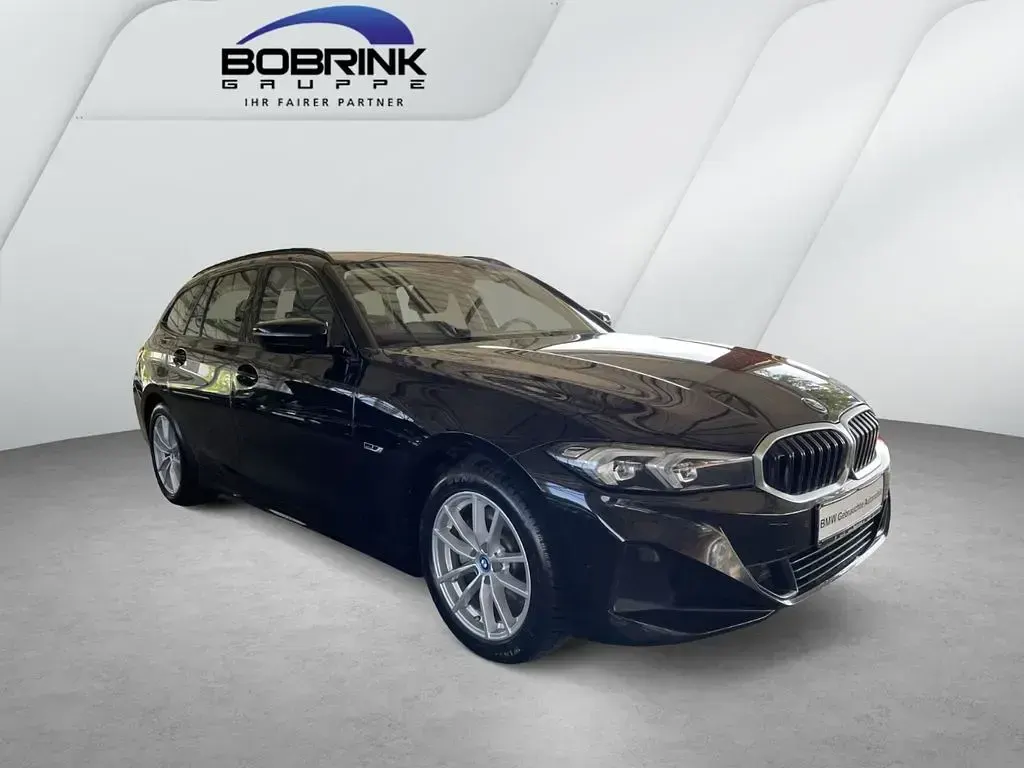 Gebraucht BMW 320e 204 PS (150 kW) 2023 Schwarz Kombi