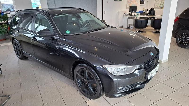 Schwarz Gebraucht 2015 BMW 330 Kombi | 16.990 € (Fairer Preis) - Bild 1/4