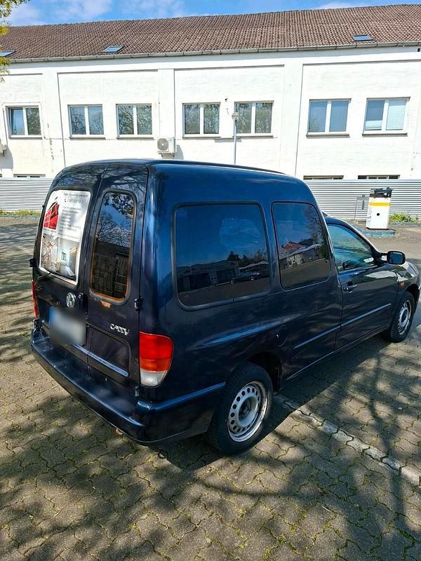 Second-hand VW Caddy 65 CP (47 kW) 2002 Albastru Monovolum