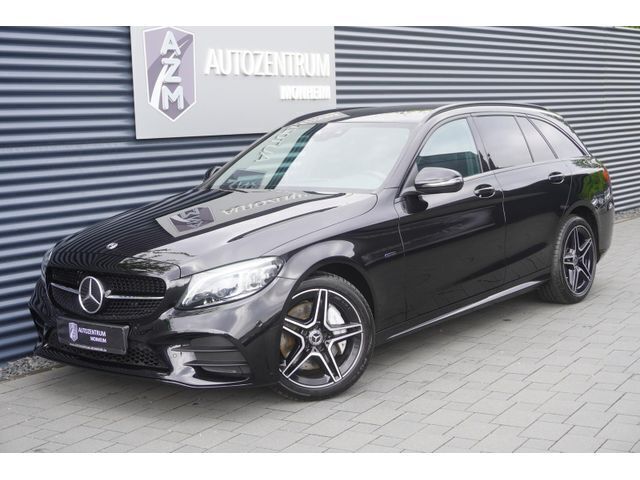(obsidianschwarz metallic) Gebraucht 2021 Mercedes C300e AMG line Kombi | 35.688 € (Teuer) - Bild 1/4