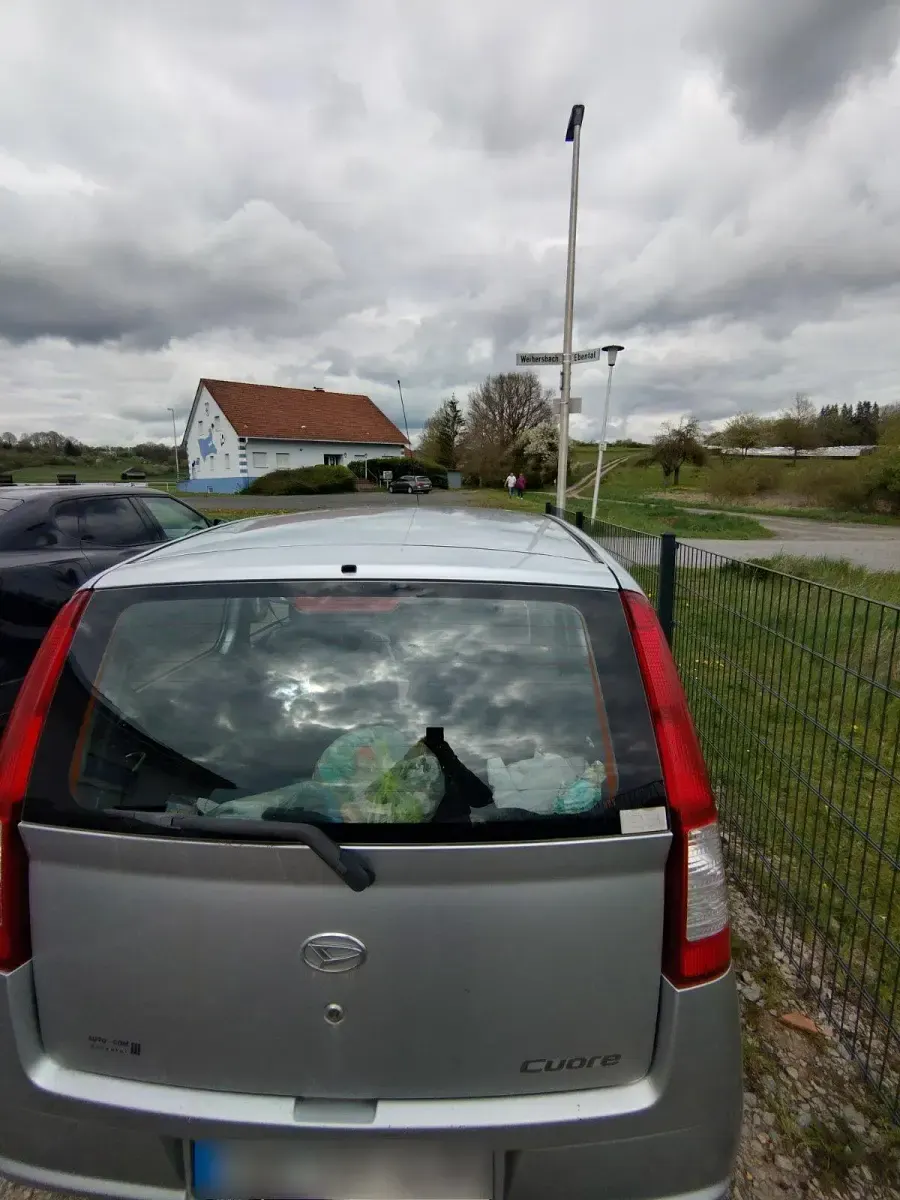 Gebraucht Daihatsu Cuore 58 PS (42 kW) 2004 Silber Kleinwagen