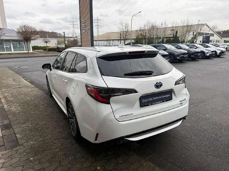 Gebraucht Toyota Corolla Hybrid Team 196 PS (144 kW) 2021 Weiß Kombi